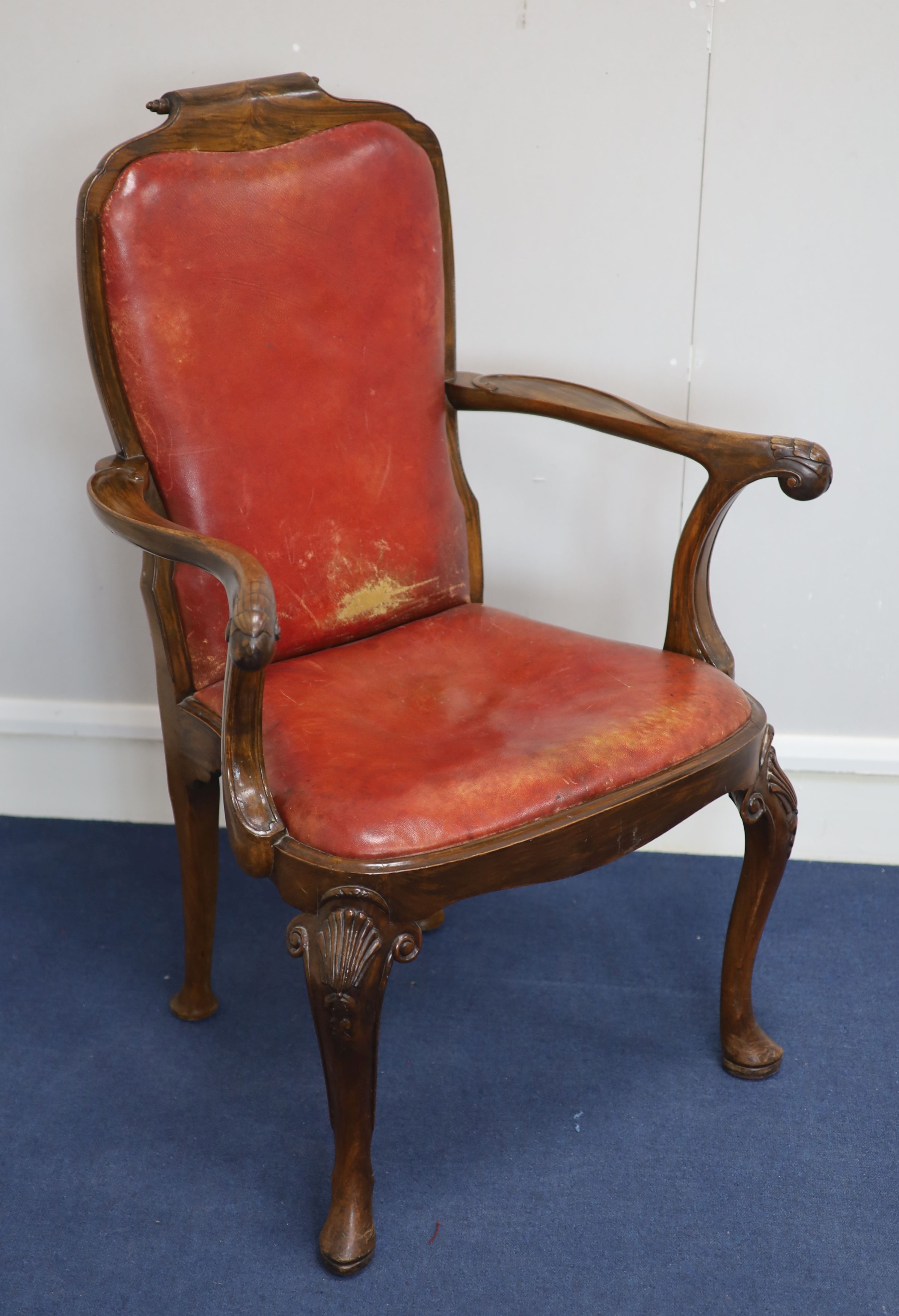 A set of four George I style walnut armchairs, first quarter 20th century,